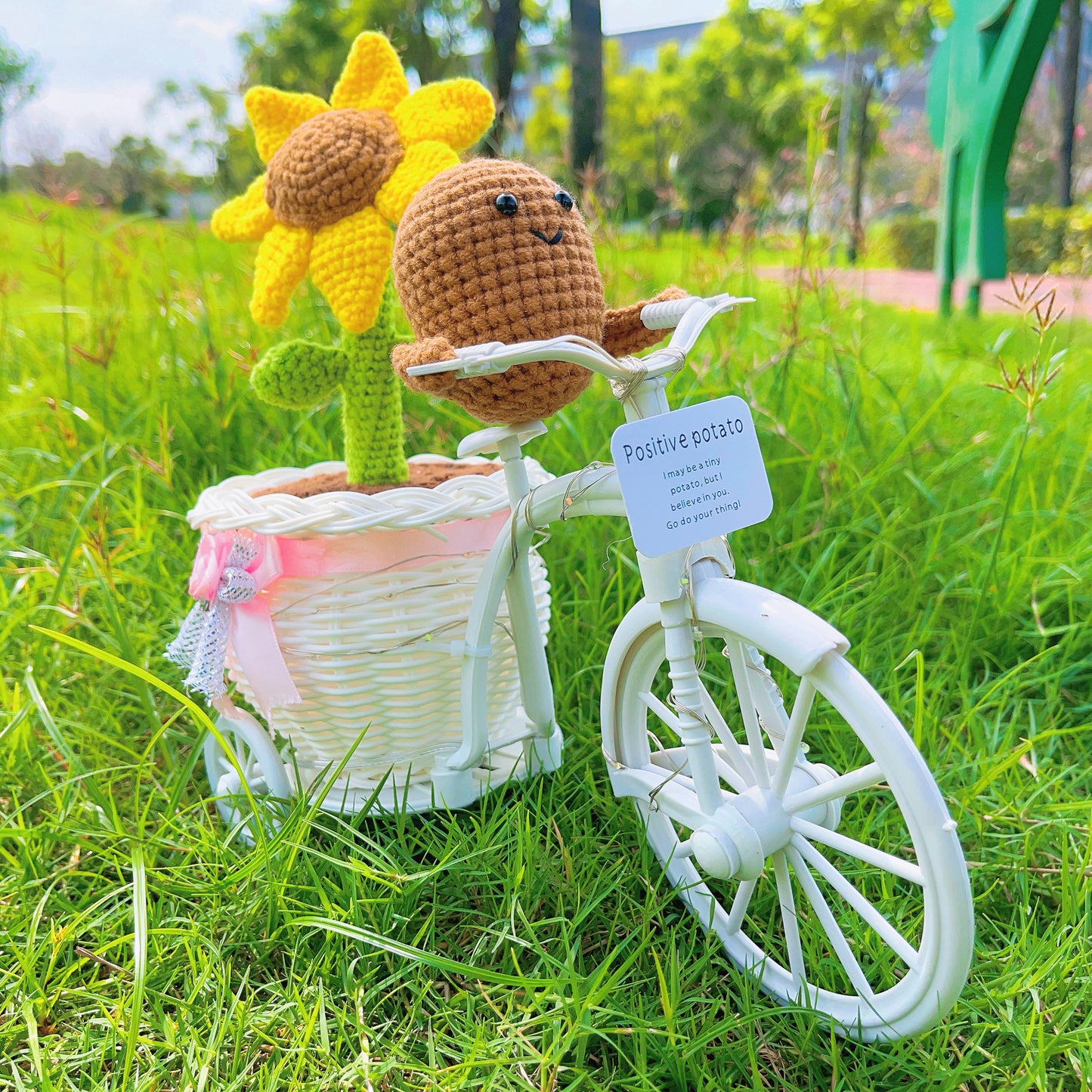 Whimsical Sunflower Pot on Bicycle: Hand-Woven Flower Basket with Sunflower Pen, LED Wire Wrap, and Positive Lemon Crochet Plushie