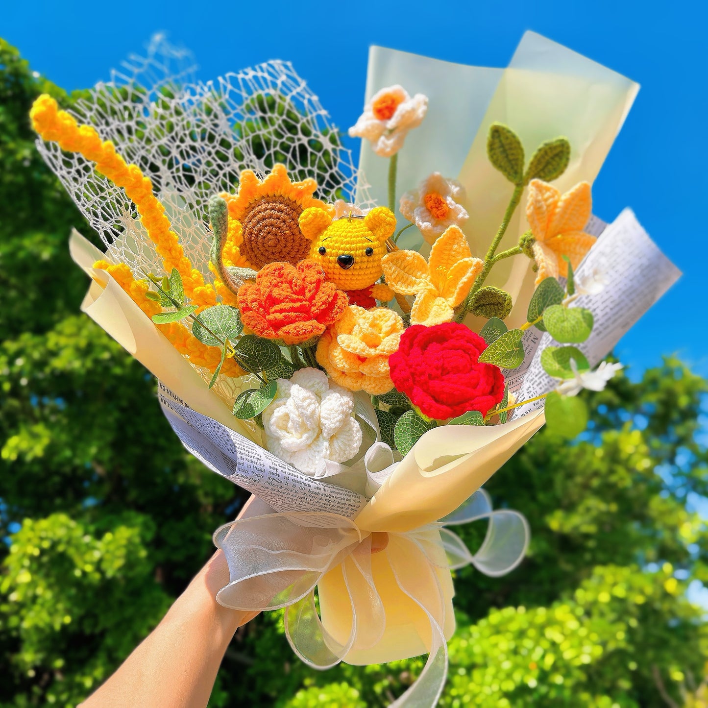 Handmade Crochet Winnie Themed Flower Bouquet - Sunflower, Golden Bell, Barley, Multi-Colored Roses, Daffodils & Money Tree Leaves in White Netting & Bright Yellow Wrap - Perfect Allergy-Friendly Gift for Any Occasion
