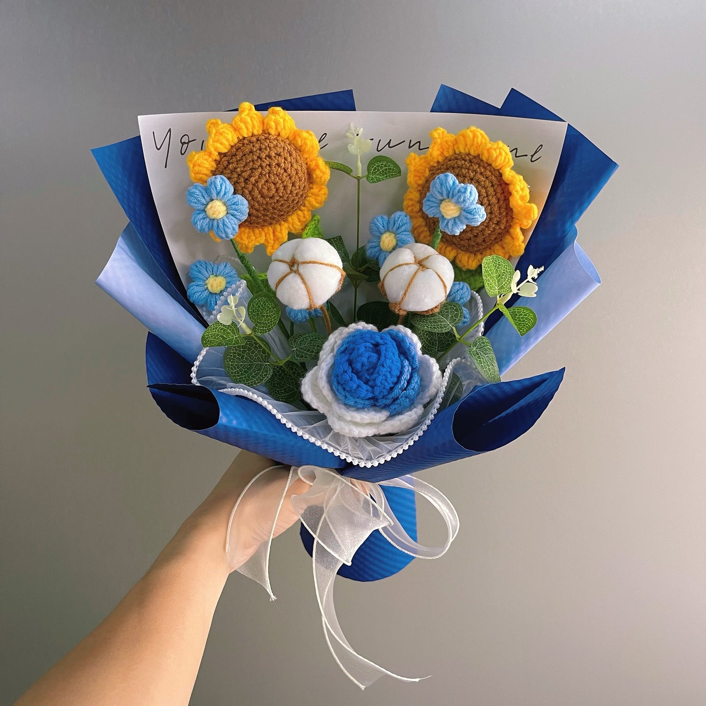 Blue Serenade: Handmade Crocheted Bouquet of Blue Flowers - Sunflowers, Pom-poms, Cotton, and Roses for Valentines - The Bloom Crafter