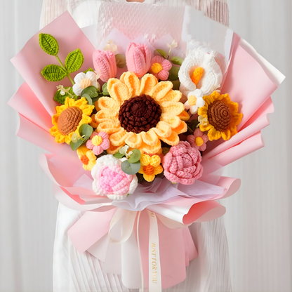 Bouquet of crocheted flowers in various colors on a white background