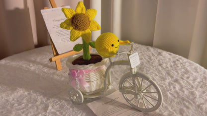 Whimsical Sunflower Pot on Bicycle: Hand-Woven Flower Basket with Sunflower Pen, LED Wire Wrap, and Positive Lemon Crochet Plushie