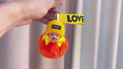 Handmade Crochet & Silicone Sleeping Baby Keychain - Plush Full-Coverage Hat with Bow Tie & Fuzzy Bottom, Hypoallergenic Cute Gift for New Parents- Perfect for Baby Showers, Mother's Day & Christening Gifts